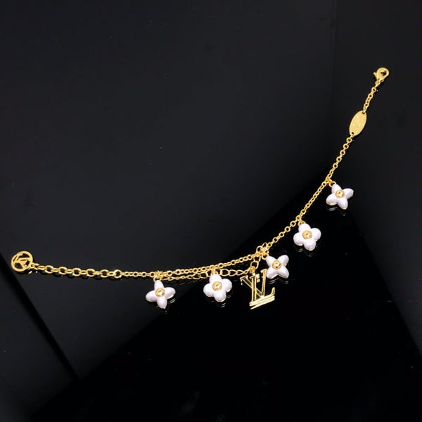 ˇTrend JewelryˇLOGO 6 MOTIF STAR AND SUN GOLD BRACELET